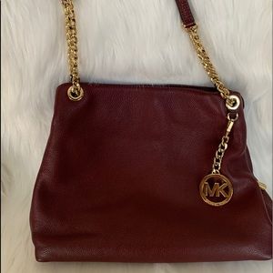 Michael Kors pebble leather shoulder tote.